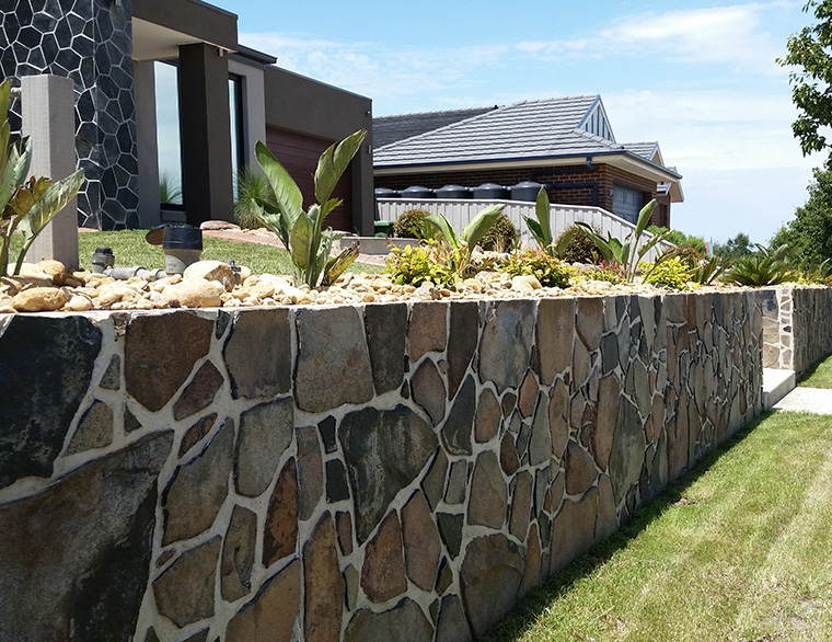 Precast concrete and stone garden wall